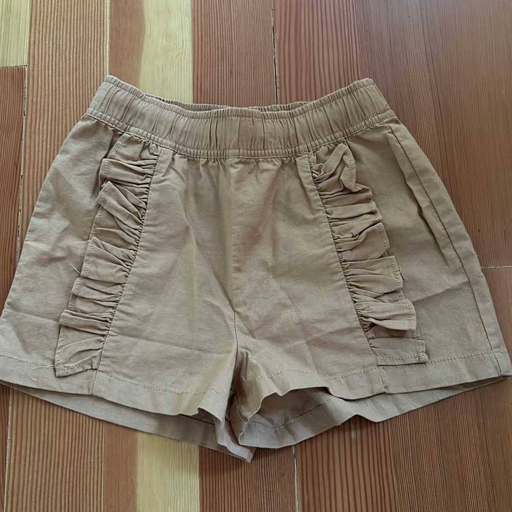 Tea rumba ruffle short, size 12 girls, balsa wood color. New, never been worn.